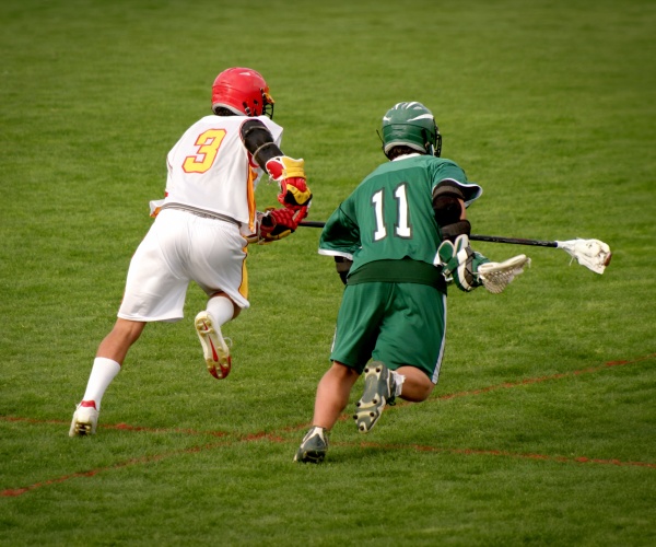 men playing lacrosse