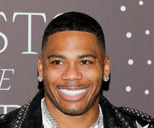 Nelly Slammed for Telling Madonna to 'Cover Up'