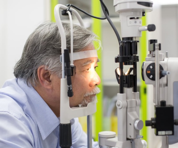 older man getting an eye exam