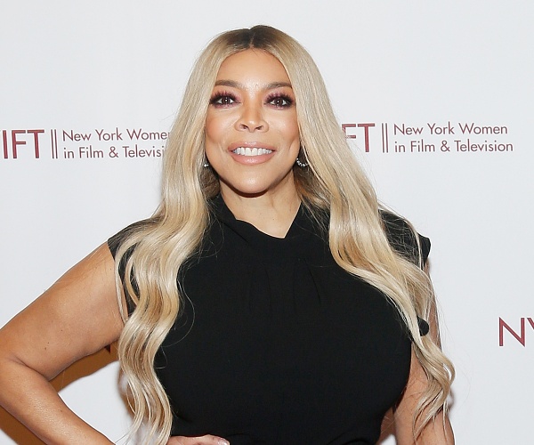 wendy williams stands on red carpet