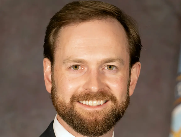 andrew ferguson poses for a portrait