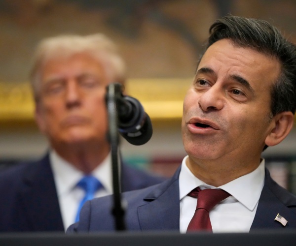 FDA Commissioner Dr. Marty Makary at the podium with President Trump behind him