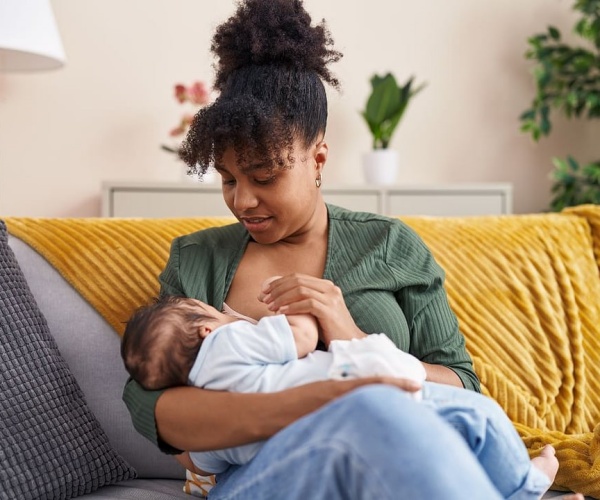 a mother breastfeeding her baby