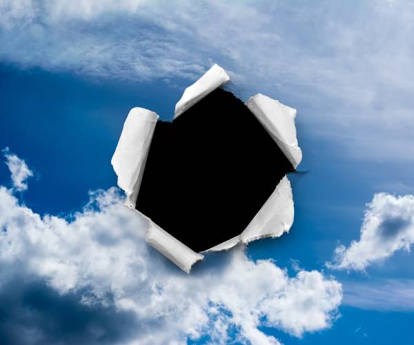 illustration of the sky with a hole ripped out