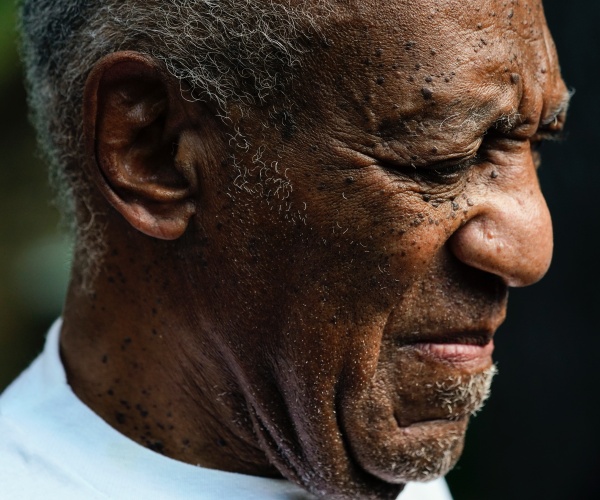 close up of bill cosby in white t shirt