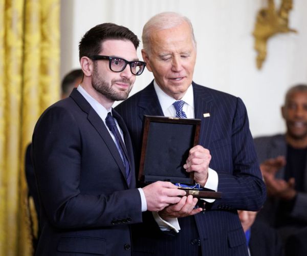 alex soros poses for photos with joe biden