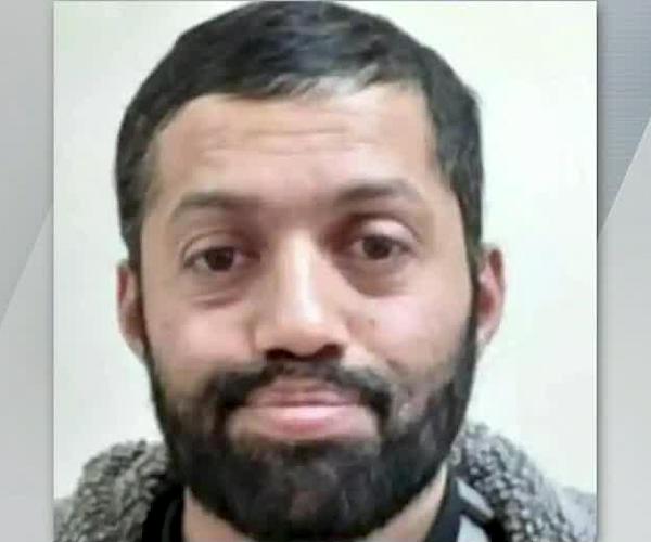 a mug shot of Faisal Akram from the new york post broadcast on newsmax