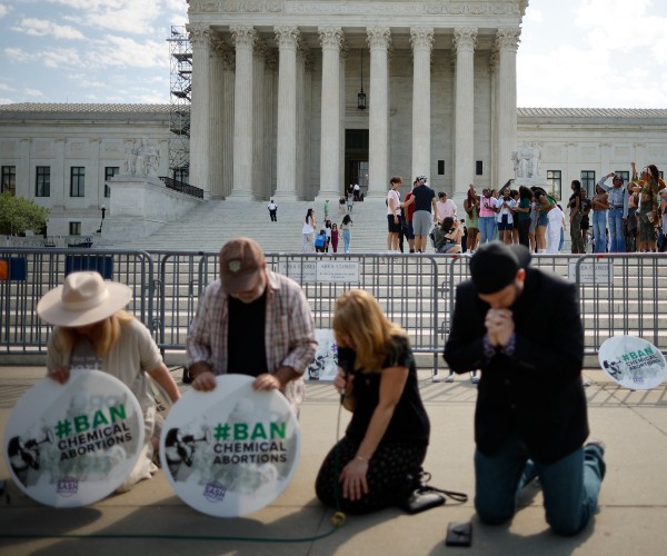 protests in opposition to anti abortion activists. 