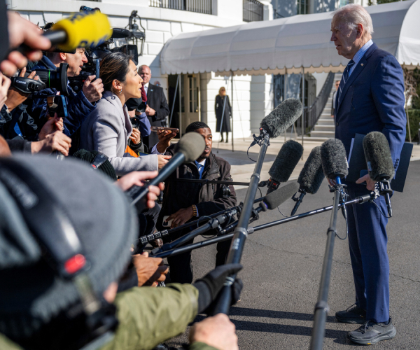 joe biden talking to the press outside the white house