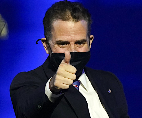 Hunter Biden gives a thumbs up during a presidential election campaign victory celebration for his father