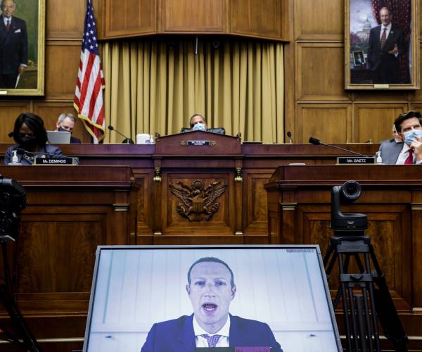 zuckerberg on video as committee members listen, wearing coronavirus masks