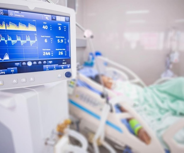 person in hospital bed