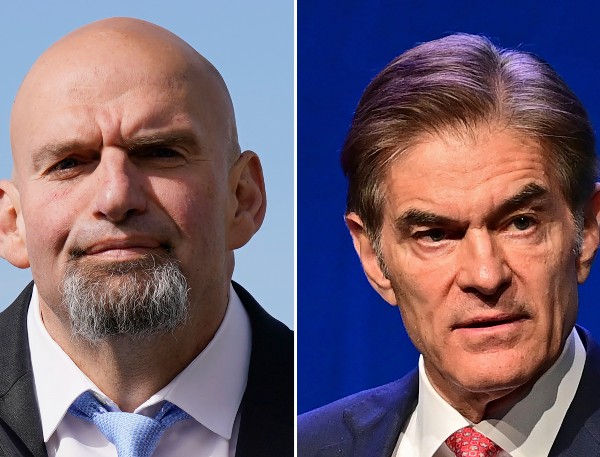 John Fetterman and Mehmet Oz look on