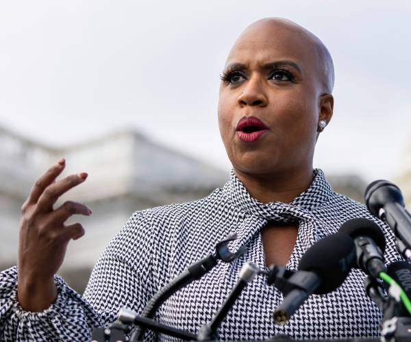 congresswoman pressley making a speach outside the capitol building