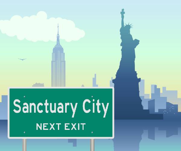 the skyline of new york city with a road sign in front reading sanctuary city next exit