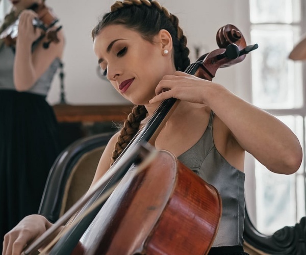 women playing violin, other string instruments