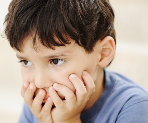 young boy looking off into distance