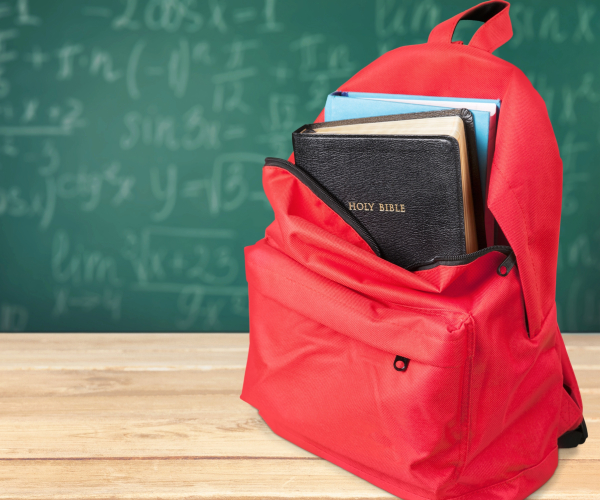 a bible in a school backpack