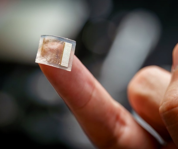 experimental skin patch shown on person's finger