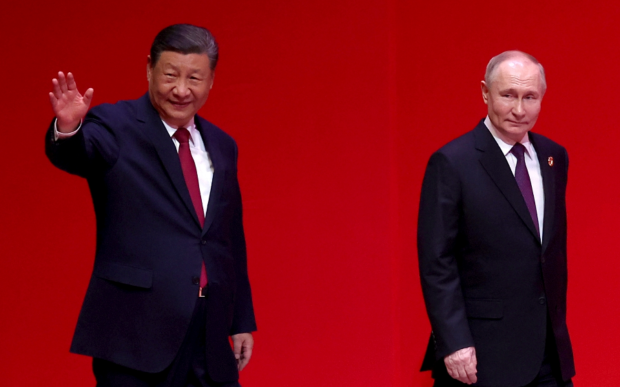 Xi Lauds China-Russia Ties as Putin Arrives in Beijing